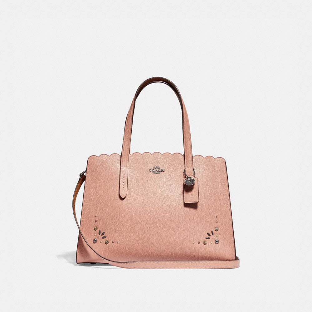 Coach charlie carryall rivets sale