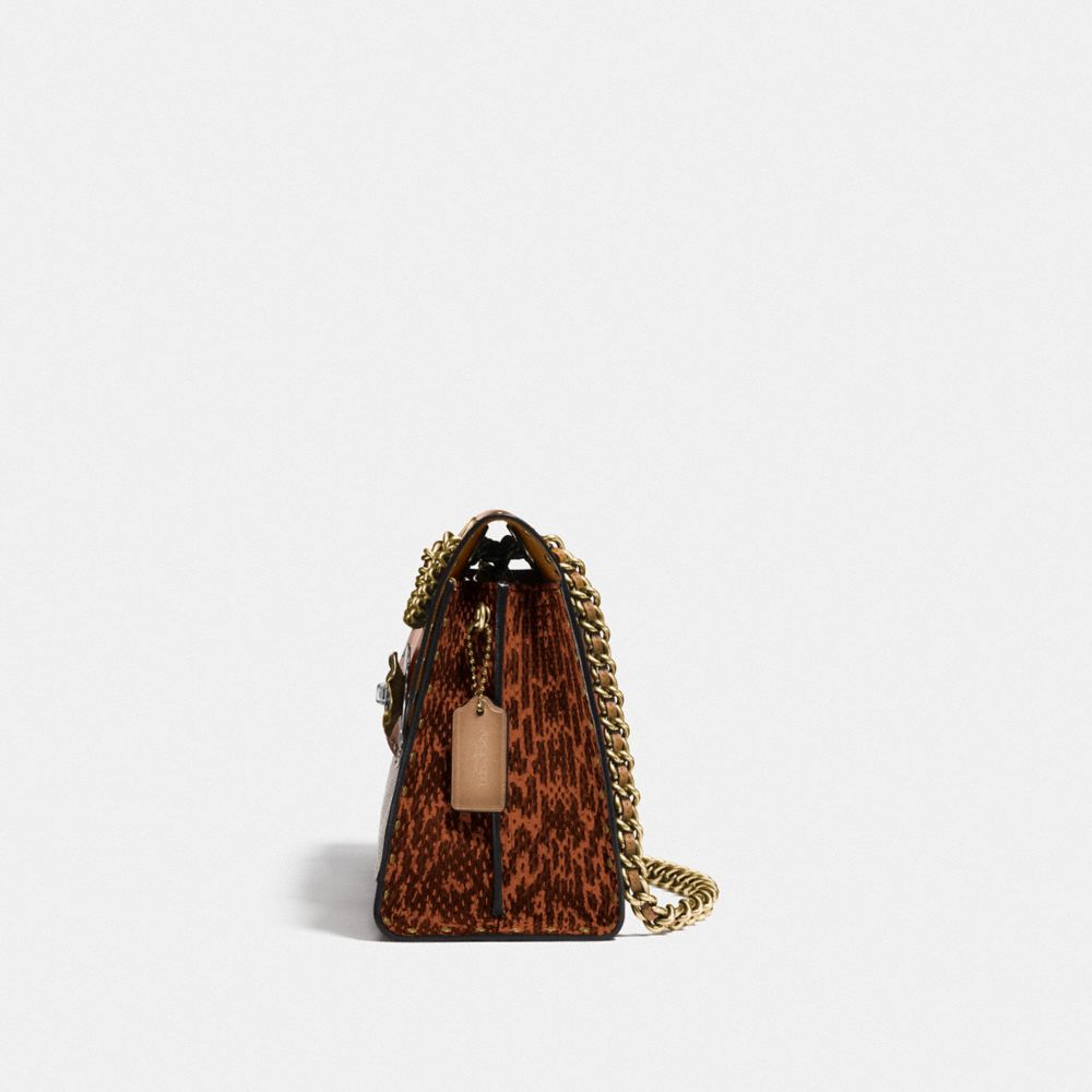 Coach snake print on sale bag