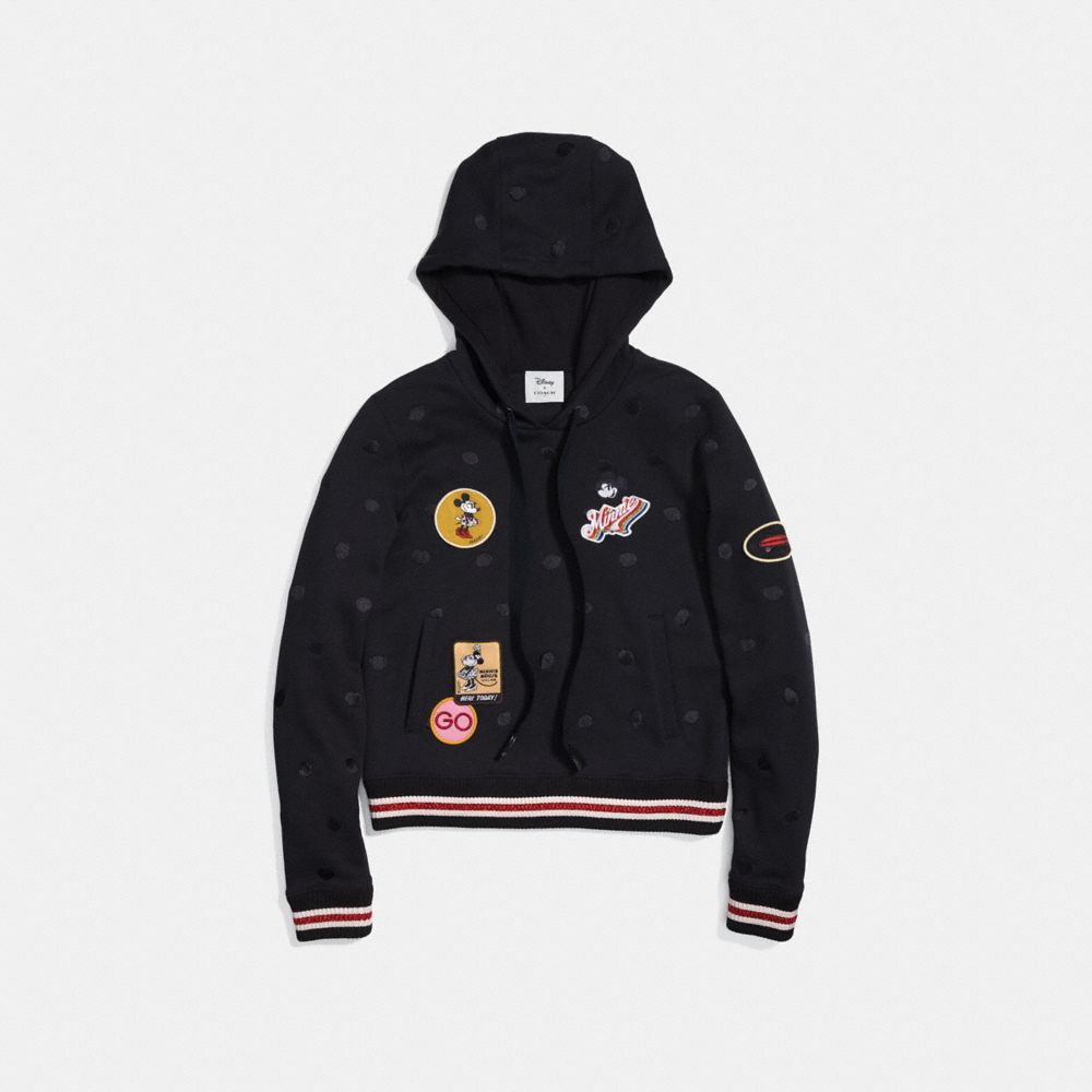 Sweat à capuche orné avec renforts