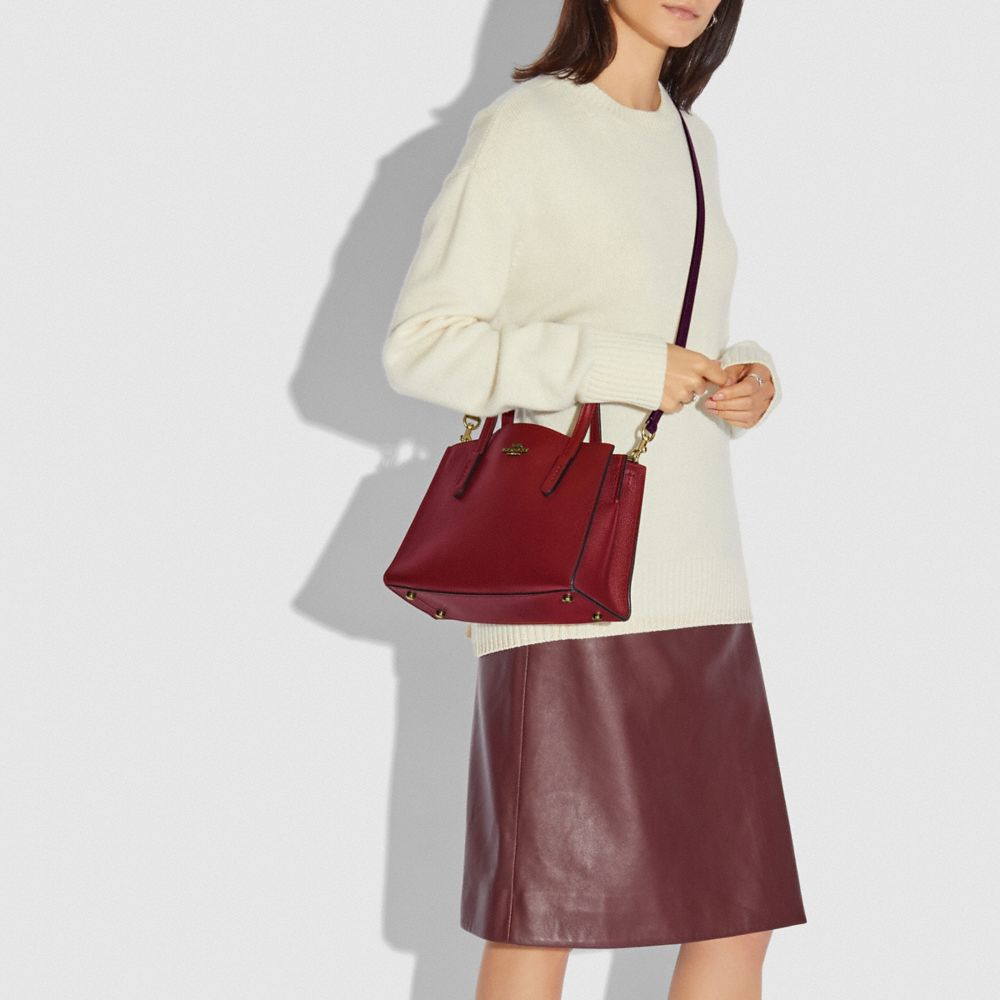 Coach charlie carryall store 28 oxblood