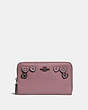 COACH®,MEDIUM ZIP AROUND WALLET WITH HEARTS,Leather,Black Copper/Dusty Rose,Front View