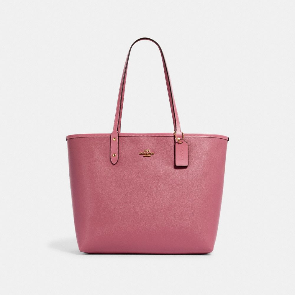 Coach pink shop reversible tote