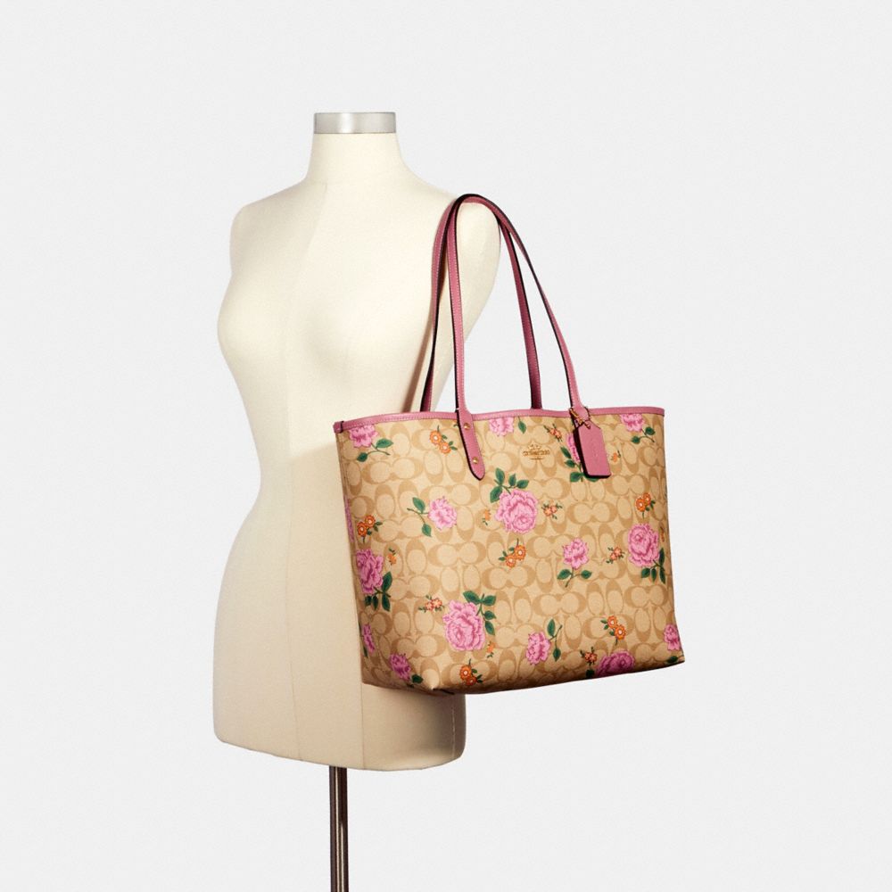 Reversible city tote in signature canvas 2024 with prairie rose print