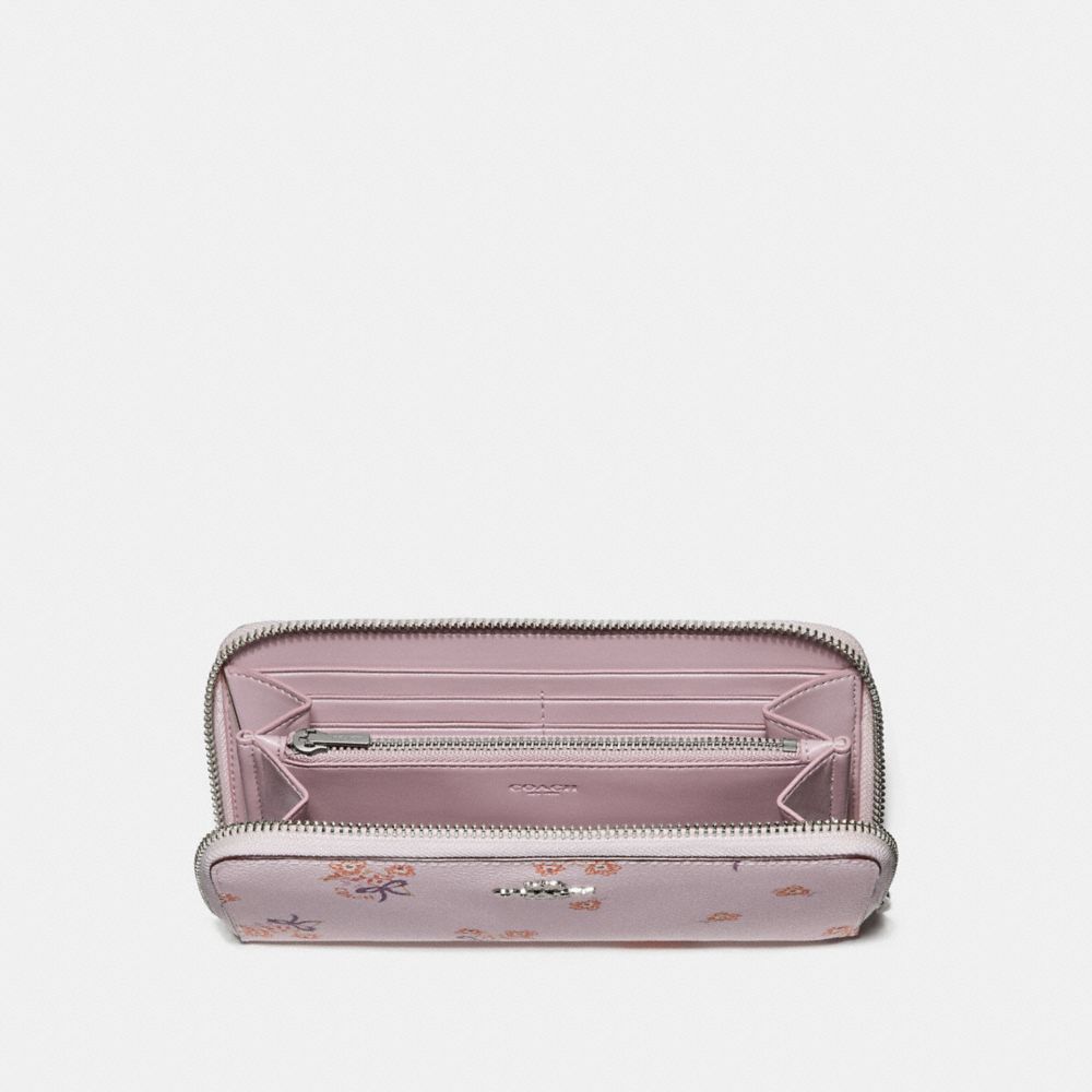 COACH®: Accordion Zip Wallet With Floral Bow Print