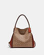 COACH®,EDIE SHOULDER BAG 31 IN SIGNATURE CANVAS WITH RIVETS,pvc,Large,Brass/Rust,Front View