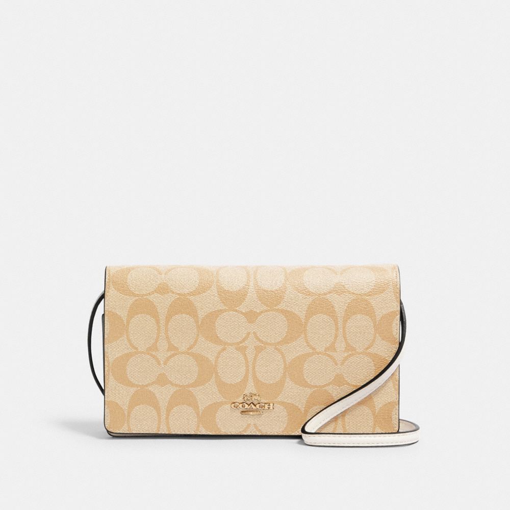 COACH®,ANNA FOLDOVER CLUTCH CROSSBODY IN SIGNATURE CANVAS,Signature Canvas,Medium,Gold/Light Khaki Chalk,Front View