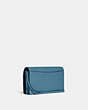COACH®,ANNA FOLDOVER CLUTCH CROSSBODY,Pebbled Leather,Medium,Anniversary,Silver/Pacific Blue,Angle View