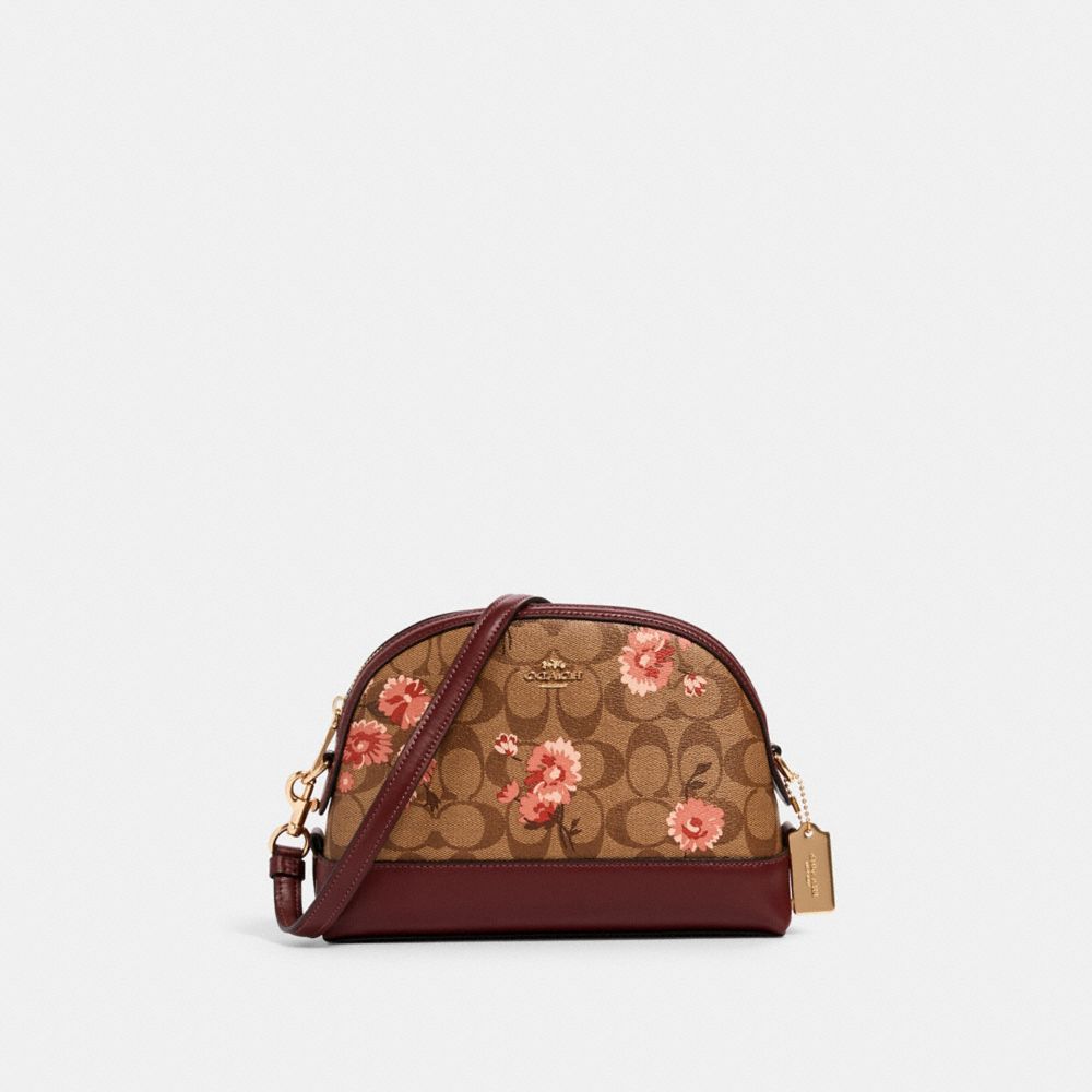 COACH®,DOME CROSSBODY IN SIGNATURE CANVAS WITH PRAIRIE DAISY CLUSTER PRINT,pvc,Gold/Khaki Coral Multi,Front View