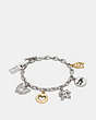 COACH®,COACH X KEITH HARING CHARM BRACELET,Metal,Gold/Silver,Front View