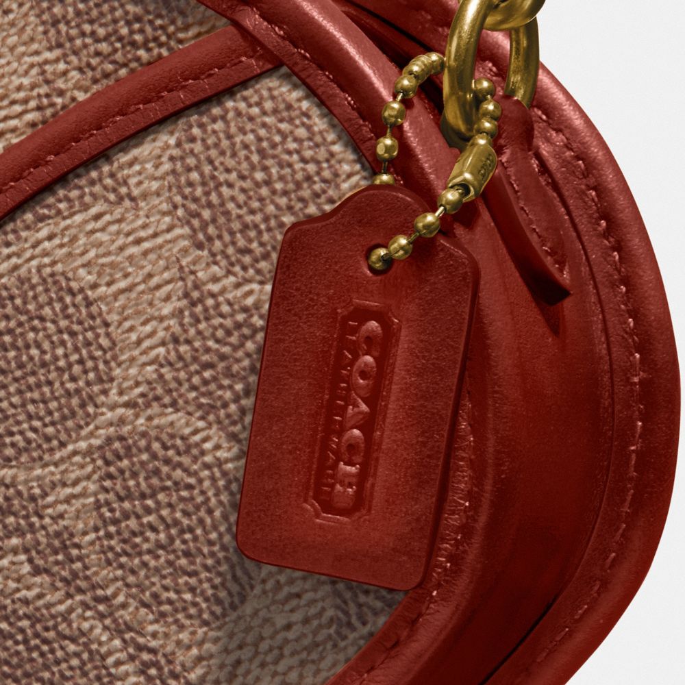 COACH®,CIRCLE COIN CASE IN SIGNATURE CANVAS,pvc,Mini,Brass/Tan/Rust,Closer View