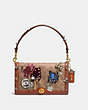 COACH®,COACH X KEITH HARING RILEY IN SIGNATURE PATCHWORK,Coated Canvas,Small,Brass/Rust,Angle View