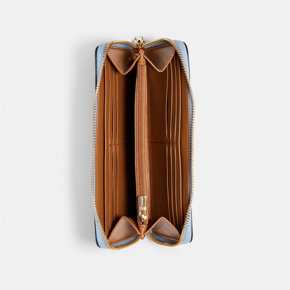 Portefeuille accordéon à zip avec imprimé orange