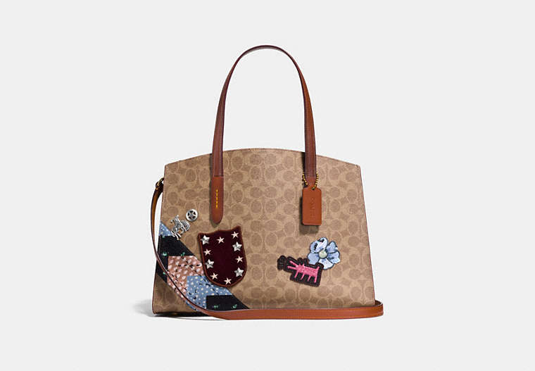 COACH®,COACH X KEITH HARING CHARLIE CARRYALL IN SIGNATURE PATCHWORK,Coated Canvas,Large,Brass/Rust,Front View