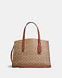 COACH®,CHARLIE CARRYALL IN SIGNATURE CANVAS,pvc,Large,Brass/Rust,Front View