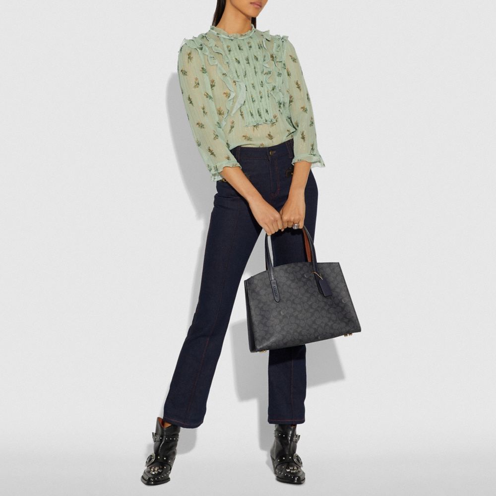 COACH®,Charlie Carryall In Signature Canvas,,Detail View