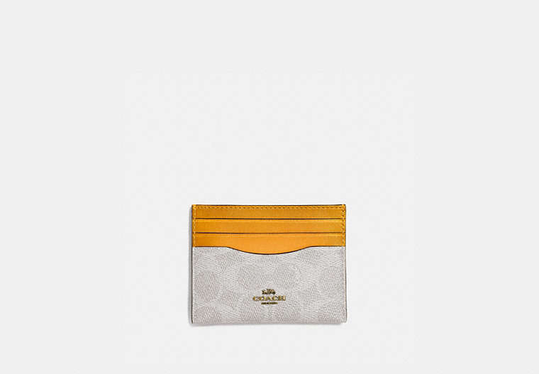 COACH®,CARD CASE IN COLORBLOCK SIGNATURE CANVAS,Signature Coated Canvas,Brass/Chalk Pollen,Front View