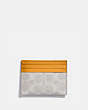 COACH®,CARD CASE IN COLORBLOCK SIGNATURE CANVAS,Signature Coated Canvas,Brass/Chalk Pollen,Back View