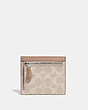 COACH®,SMALL WALLET IN COLORBLOCK SIGNATURE CANVAS,pvc,Light Antique Nickel/Sand Taupe,Back View