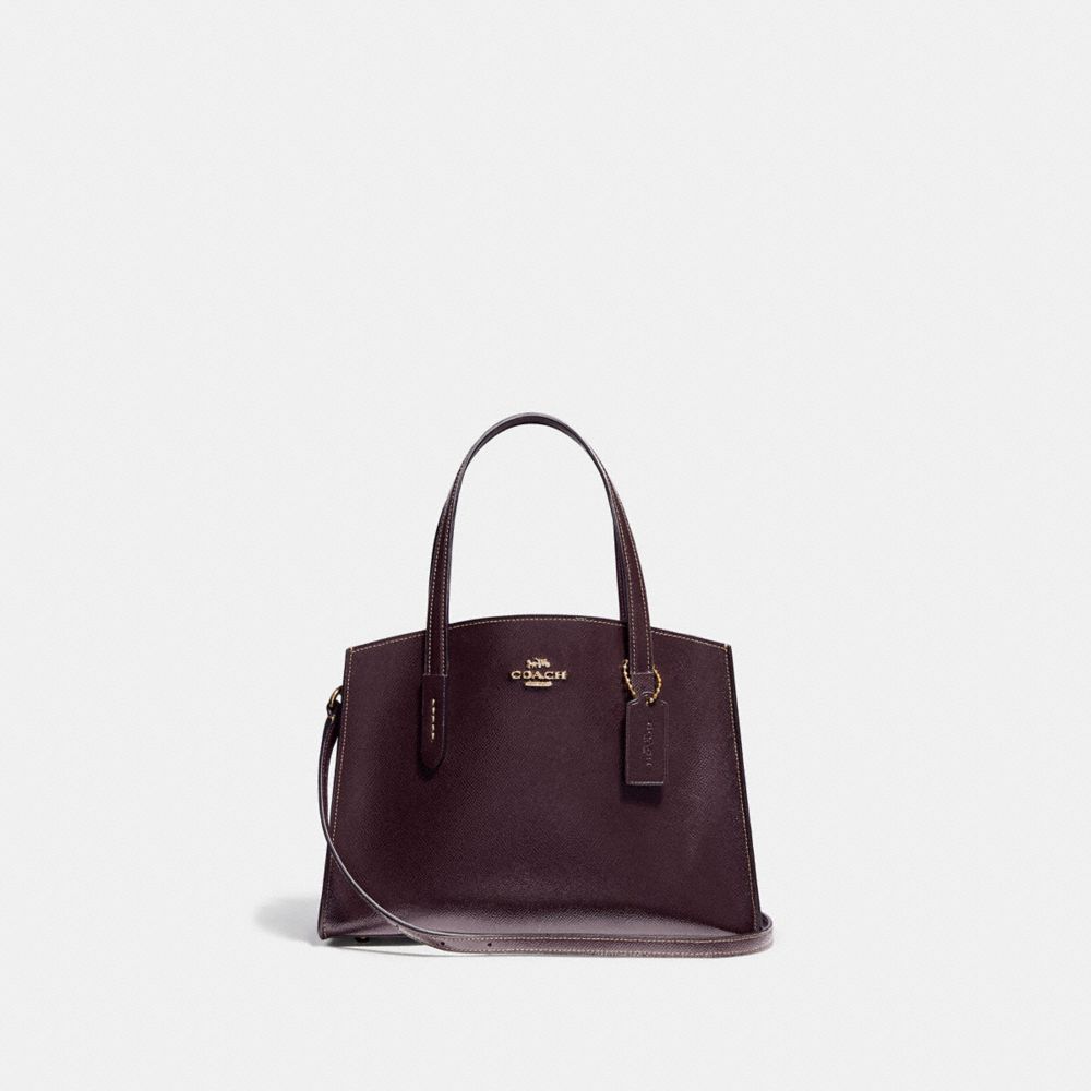 COACH®,CHARLIE CARRYALL 28,Leather,Medium,Light Gold/Oxblood,Front View