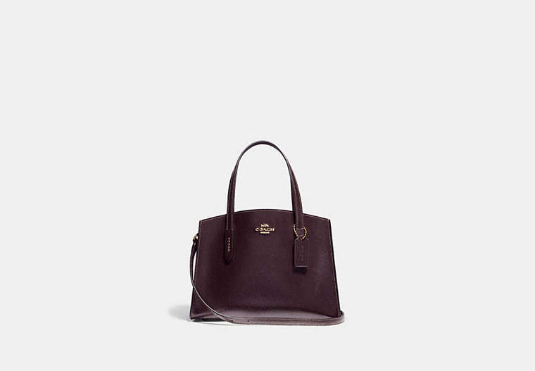 COACH®,CHARLIE CARRYALL 28,Leather,Medium,Light Gold/Oxblood,Front View