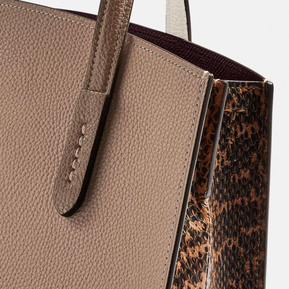 COACH COACH Charlie Carryall 28 With Colorblock Snakeskin Detail