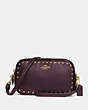 COACH®,SADIE CROSSBODY CLUTCH WITH RIVETS,Leather,Brass/Oxblood,Front View