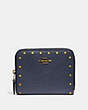 COACH®,SMALL ZIP AROUND WALLET WITH RIVETS,Leather,Brass/Midnight Navy,Front View