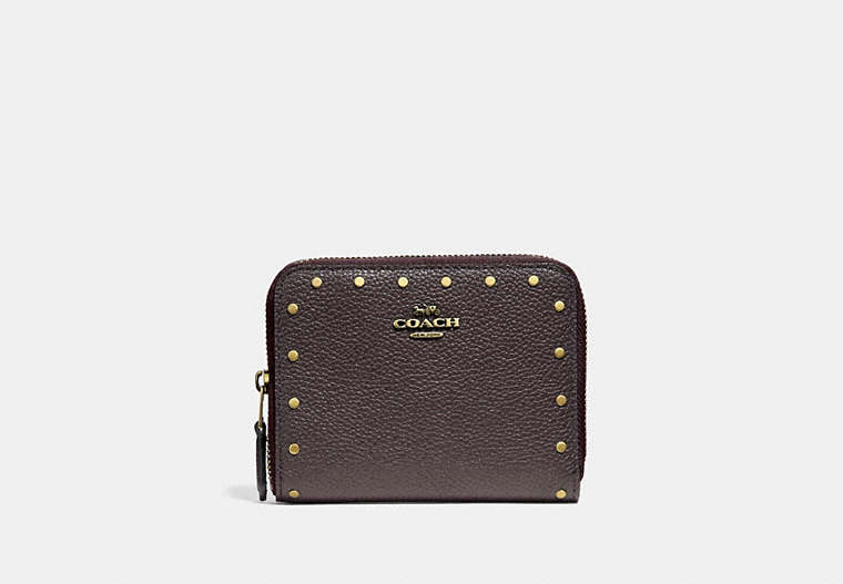 COACH®,SMALL ZIP AROUND WALLET WITH RIVETS,Leather,Brass/Oxblood,Front View