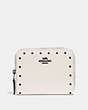COACH®,SMALL ZIP AROUND WALLET WITH RIVETS,Leather,Black Copper/Chalk,Front View