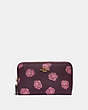 COACH®,MEDIUM ZIP AROUND WALLET WITH ROSE PRINT,pvc,Gold/Oxblood Rose Print,Front View