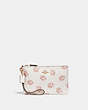 COACH®,SMALL WRISTLET WITH ROSE PRINT,Coated Canvas,Chalk Rose Print/Light Gold,Front View