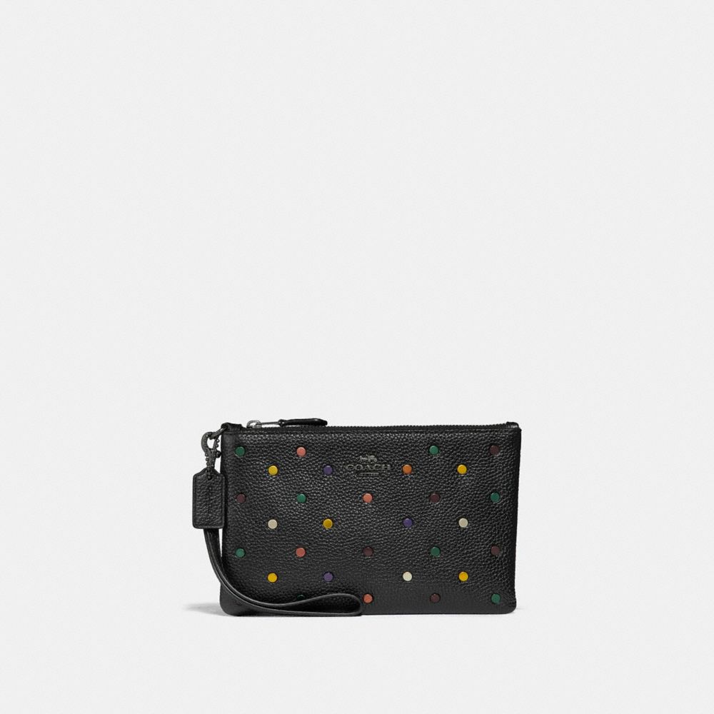 Coach crossbody pouch on sale with rainbow rivets