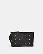 Small Wristlet With Rainbow Rivets