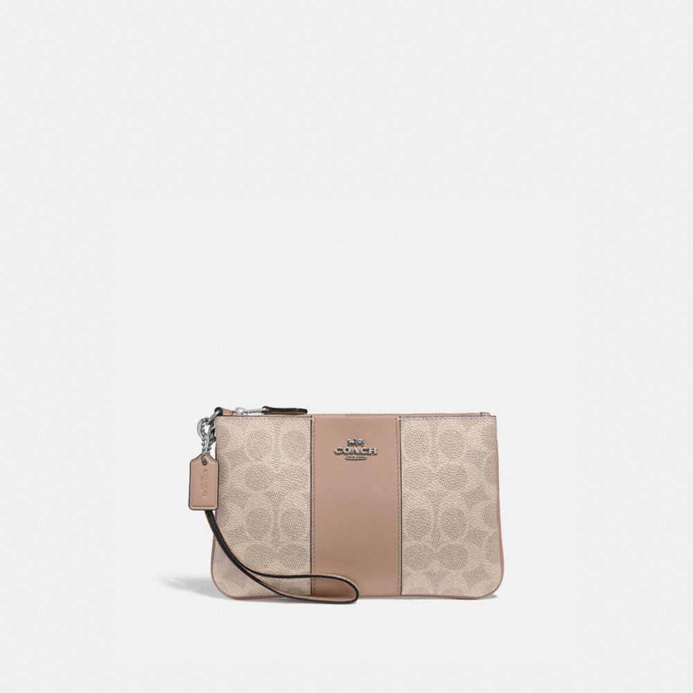 COACH®,SMALL WRISTLET IN COLORBLOCK SIGNATURE CANVAS,Medium,Light Antique Nickel/Sand Taupe,Front View