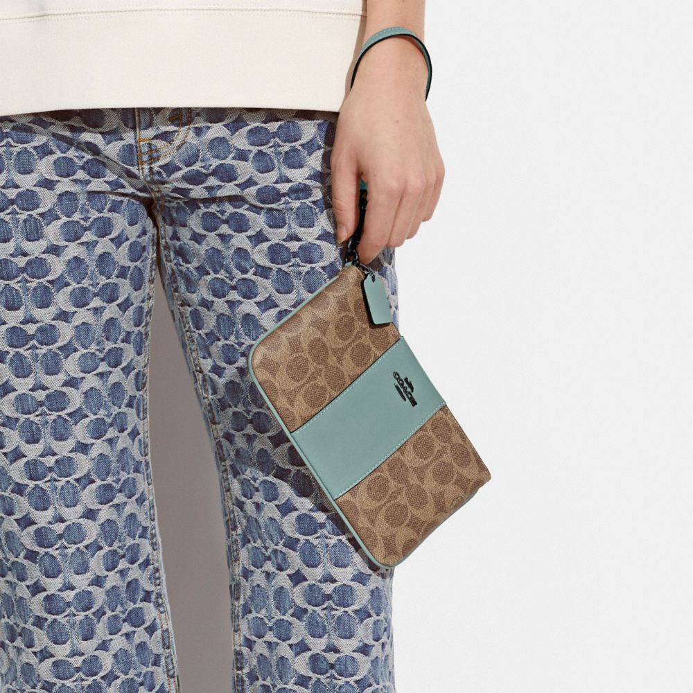 COACH®: Small Wristlet In Signature Canvas