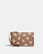 COACH®,SMALL WRISTLET IN SIGNATURE ROSE PRINT,Coated Canvas,Brass/Tan,Front View