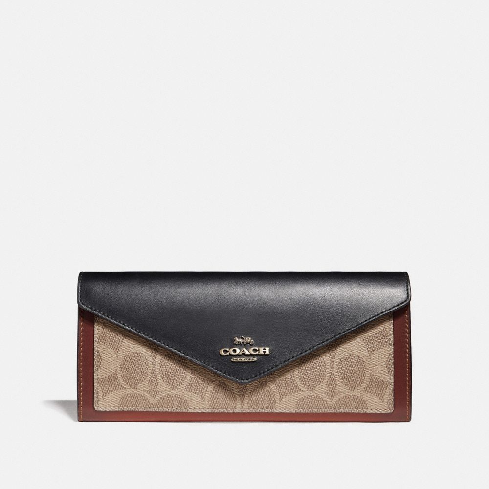 COACH®,SOFT WALLET IN COLORBLOCK SIGNATURE CANVAS,pvc,Brass/Tan/Black,Front View