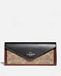 COACH®,SOFT WALLET IN COLORBLOCK SIGNATURE CANVAS,pvc,Brass/Tan/Black,Front View