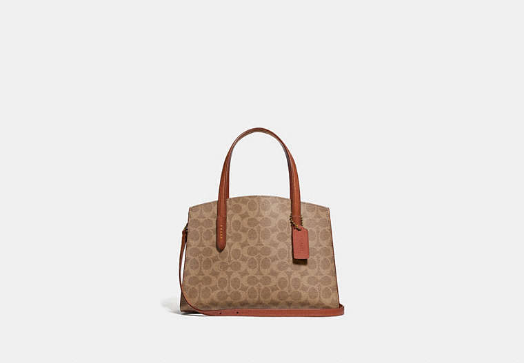 COACH®,CHARLIE CARRYALL 28 IN SIGNATURE CANVAS,Signature Coated Canvas,Medium,Brass/Rust,Front View