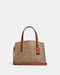 COACH®,CHARLIE CARRYALL 28 IN SIGNATURE CANVAS,Signature Coated Canvas,Medium,Brass/Rust,Front View