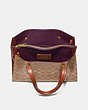 COACH®,CHARLIE CARRYALL 28 IN SIGNATURE CANVAS,Signature Coated Canvas,Medium,Brass/Rust,Inside View,Top View