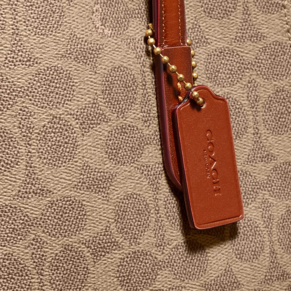 COACH®,Charlie Carryall 28 In Signature Canvas,,Closer View