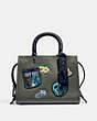 COACH®,DISNEY X COACH ROGUE 25 WITH PATCHES,Leather,Black Copper/Army Green,Front View