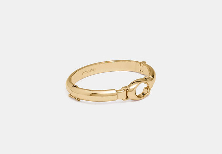 COACH®,SCULPTED SIGNATURE PLAQUE BANGLE,Plated Brass,Gold,Front View