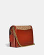 COACH®,HUTTON SHOULDER BAG IN SIGNATURE CANVAS,Signature Coated Canvas/Smooth Leather,Small,Brass/Tan/Rust,Angle View