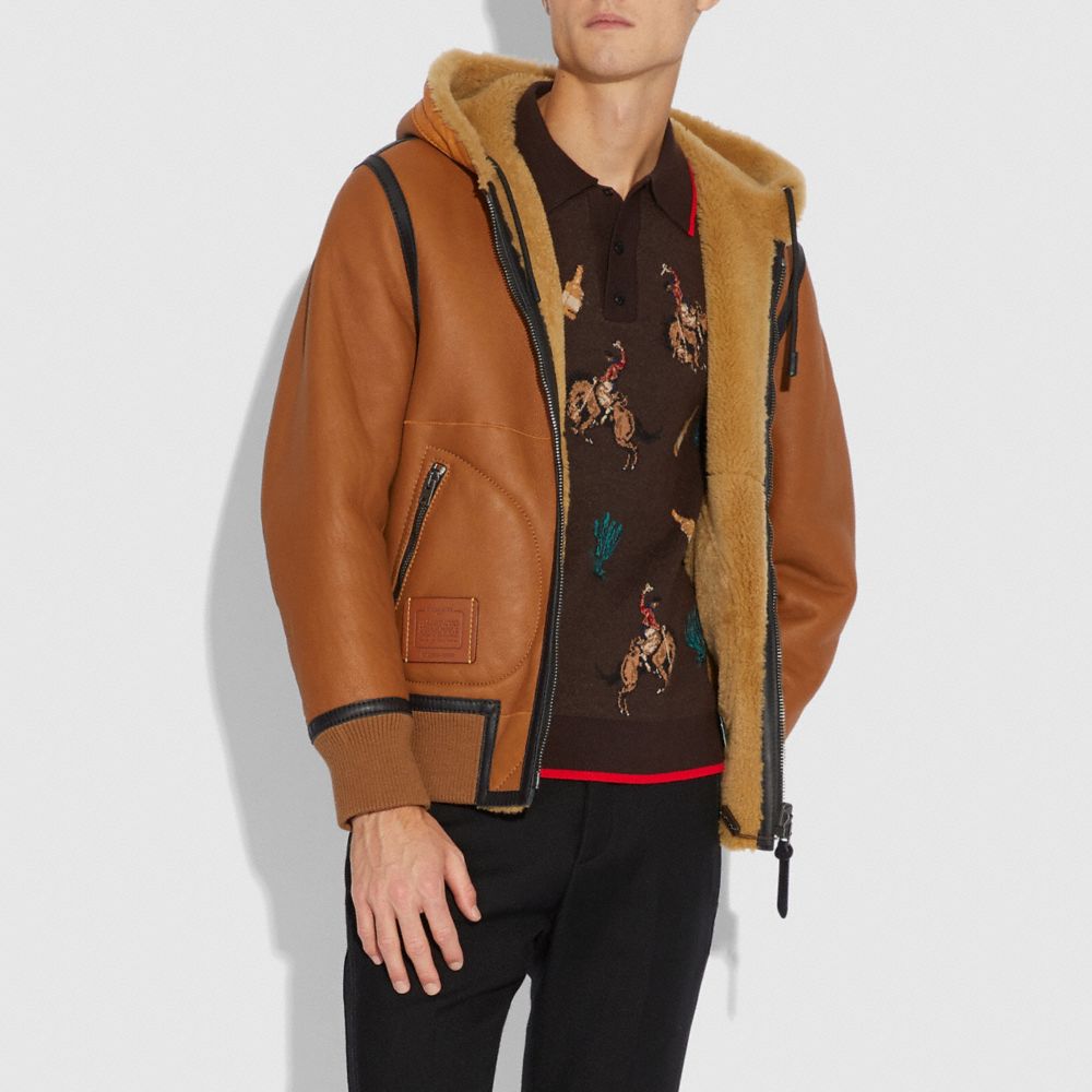 Coach reversible shop shearling hoodie