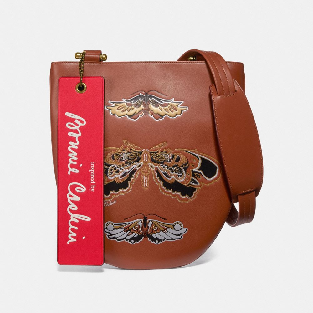 Coach sling on sale bag with tattoo