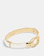 COACH®,SIGNATURE TENSION BANGLE,Plated Brass,GOLD/CHALK,Front View