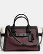 COACH®,COACH SWAGGER WITH CHAIN IN PEBBLE LEATHER,Leather,Large,Black Antique/Tan Multi,Front View