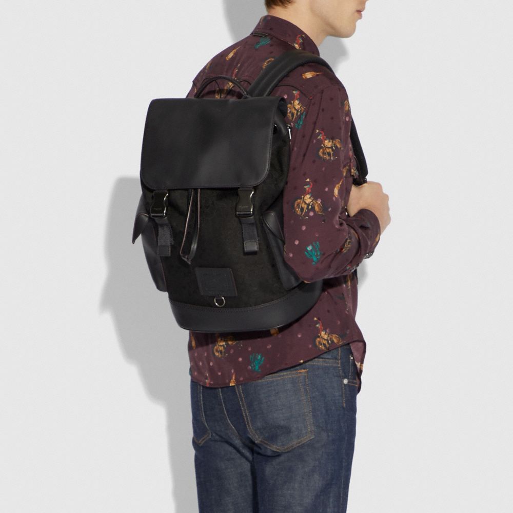 COACH® Restored Rivington Backpack In Signature Canvas